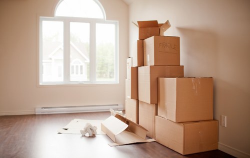 Professional movers preparing furniture for a Kentishtown relocation