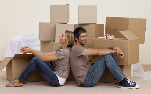Organized storage unit with stacked boxes and furniture