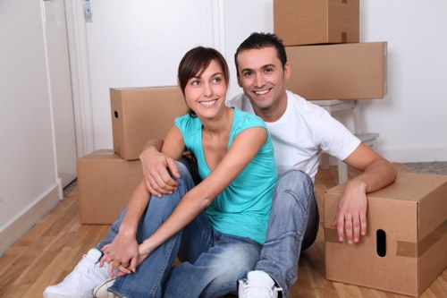 Professional movers handling boxes in Kentishtown